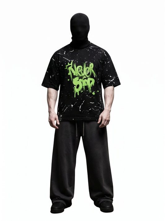 "NEVER STOP" Oversized Streetwear T-Shirt – All-Over Splatter Print (Black)