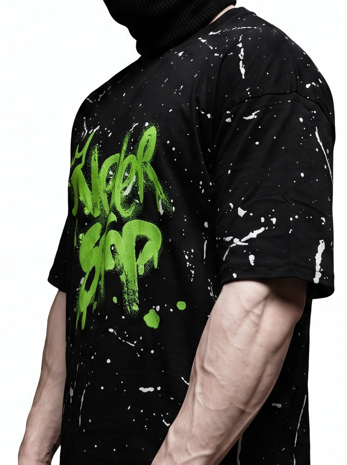 "NEVER STOP" Oversized Streetwear T-Shirt – All-Over Splatter Print (Black)